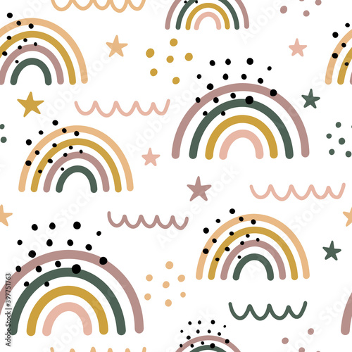 Cute abstract seamless pattern with rainbows, stars and dots. Hand drawn Scandinavian style vector illustration.