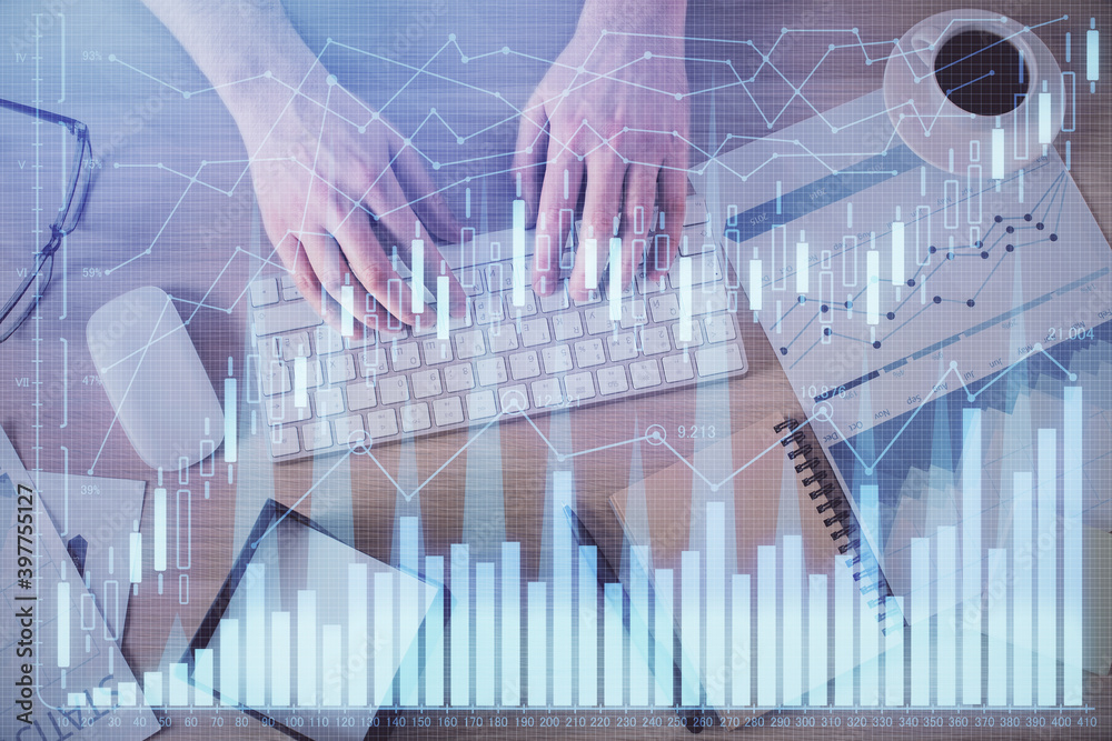 Multi exposure of man's hands typing over computer keyboard and forex graph hologram drawing. Top view. Financial markets concept. Multi exposure of man's hands typing over computer keyboard and forex graph hologram drawing. Top view. Financial markets concept.