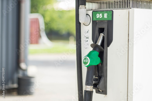 Close-up of gas pump on white bio gas station. Gasoline fuel pump. Petrol filling station.
