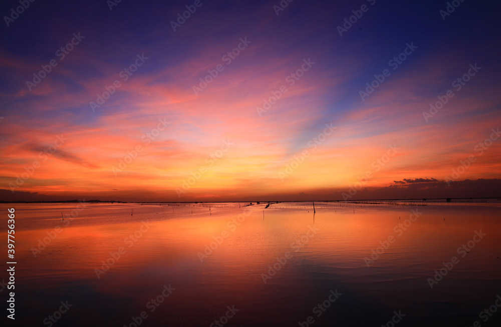 Natural Magical sunset reflec on sea at Chonburi, Thailand Natural Magical sunset reflec on sea at Chonburi, Thailand