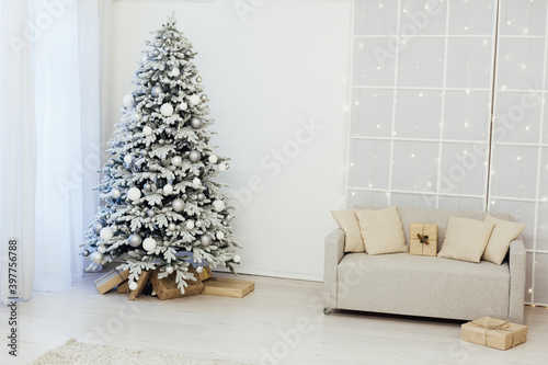Christmas tree with gifts for the new year interior decor