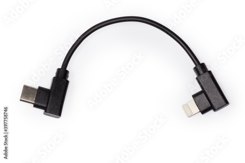 Short cable USB Type-C to Lightning on white background