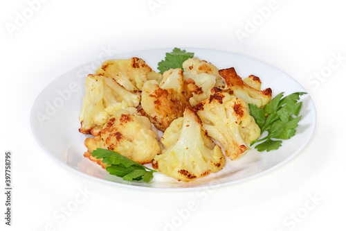 Canvastavla Pieces of blanched cauliflower fried in batter on dish