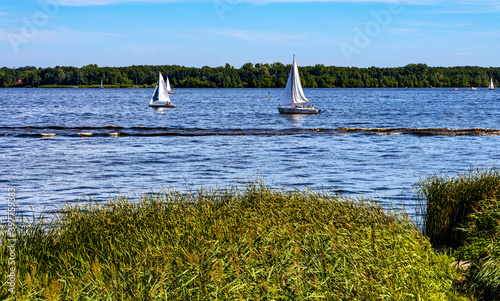 Panoramic view of Zegrzynskie Reservoir Lake and Narew river with yachts and boats in Zegrze resort town in Mazovia region, near Warsaw, Poland photo