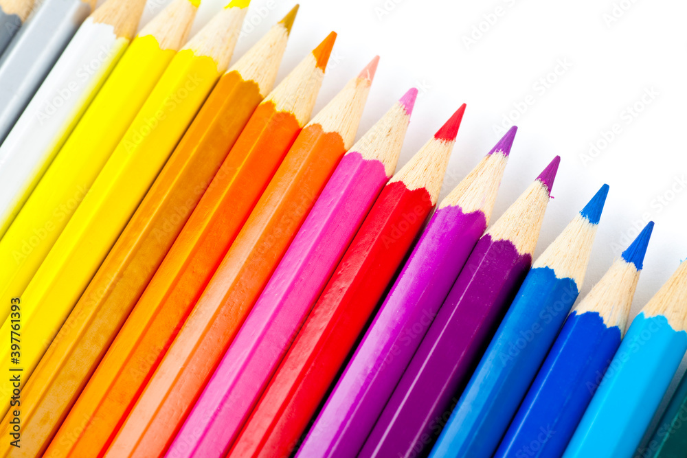 Colorful pencils in a gradient scale. Studio photo isolated on white background. Colorful pencils in a gradient scale. Studio photo isolated on white background.