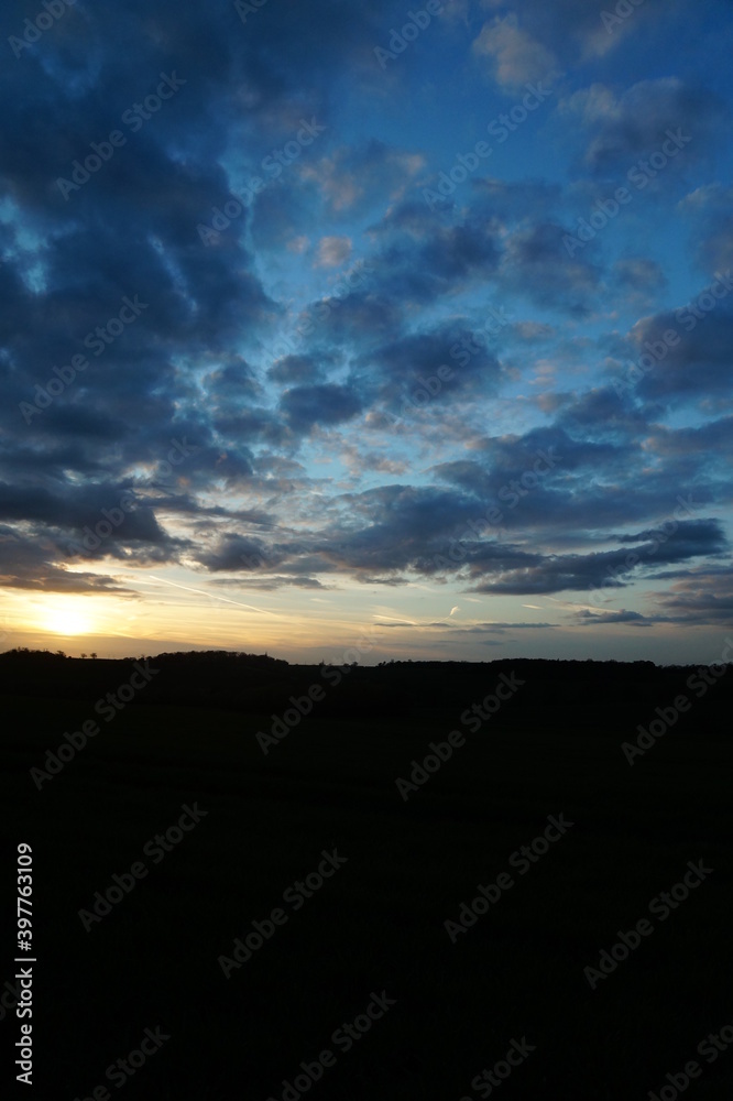 colourful sunset sky over fields in essex, photographed in April 2017 colourful sunset sky over fields in essex, photographed in April 2017