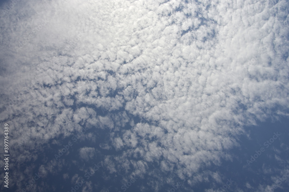 Ravda, Bulgaria. May 28 2014. White cirrus clouds in blue sky in sunlight.