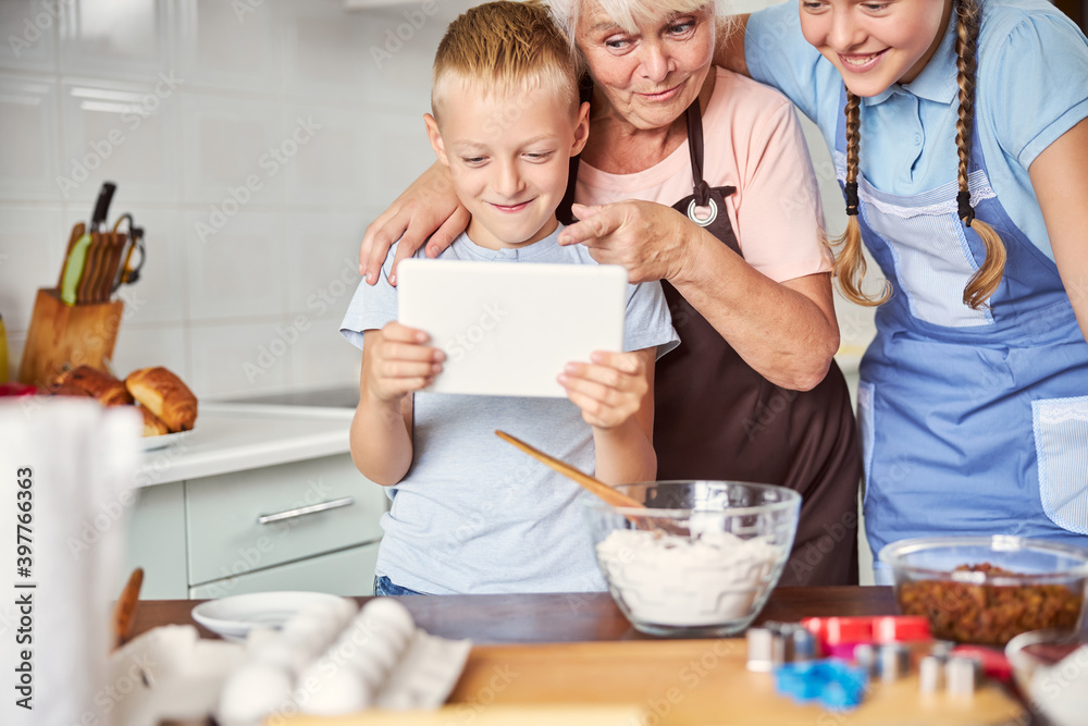Younger generation passing on technology skills to Grandma Younger generation passing on technology skills to Grandma
