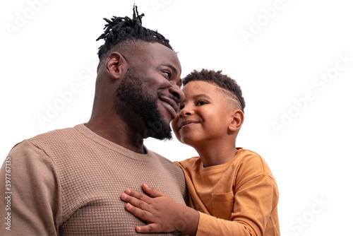 Fényképezés Waist up portrait of dark skinned African male and his little son spending time