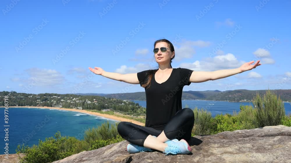 Active woman exercise yoga on top of Lighthouse hill in Sydney on Pacific 4k.
Active woman exercise yoga on top of Lighthouse hill in Sydney on Pacific 4k.