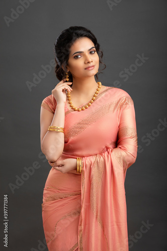 Photography Pretty Indian young girl dress up saree for festival.