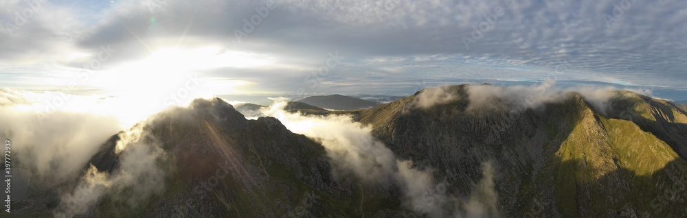 Winter aerial view of Snowdonia in Wales, the Glyderau mountains in cloud