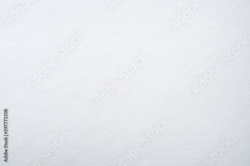 White paper textured background, close up.