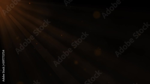 Dramatic golden light beam with flying flicker particles and smoke effect abstract background. 