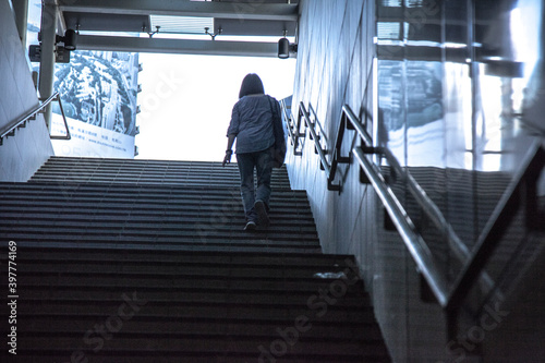 people walking on escalator