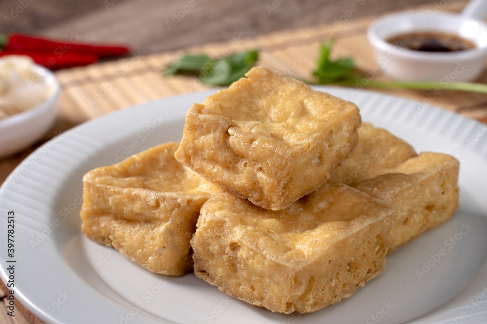 Deep fried stinky tofu with pickled cabbage street food in Taiwan. Deep fried stinky tofu with pickled cabbage street food in Taiwan.