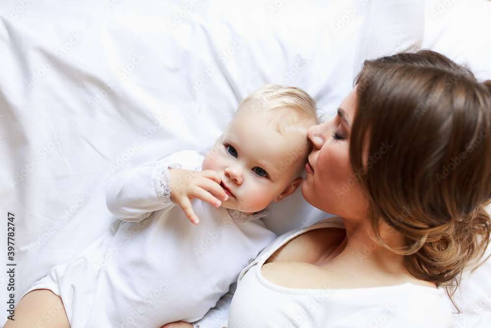 Love of a mother and baby. Family at home. Lifestyle Love of a mother and baby. Family at home. Lifestyle