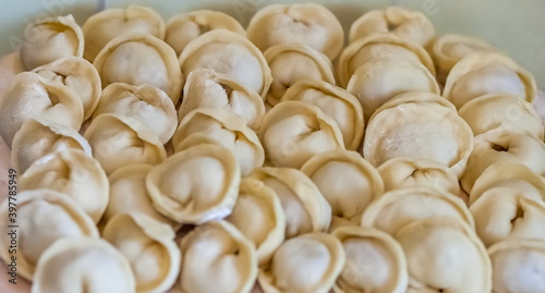 Dumplings of dough and meat handmade closeup