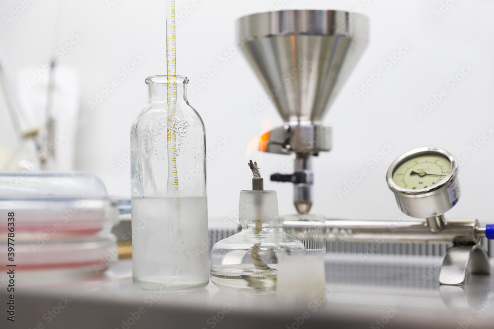 Chemical equipment, dishes, and an alcohol burner. Chemical equipment, dishes, and an alcohol burner.