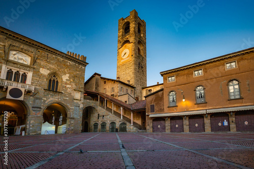 Beautiful architecture of the Piazza Vecchia in Bergamo at dawn, Italy