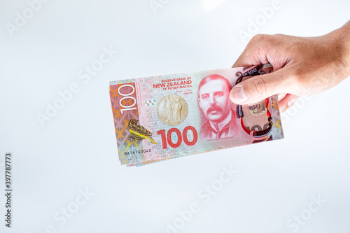 New Zealand Dollars banknotes on white background.