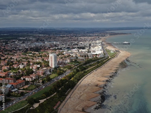Aerial drone shot of the cityscape of Eastbourne, United Kingdom on a cloudy day