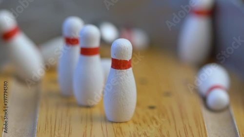 Bowling ball on the track in order to knock down the pins