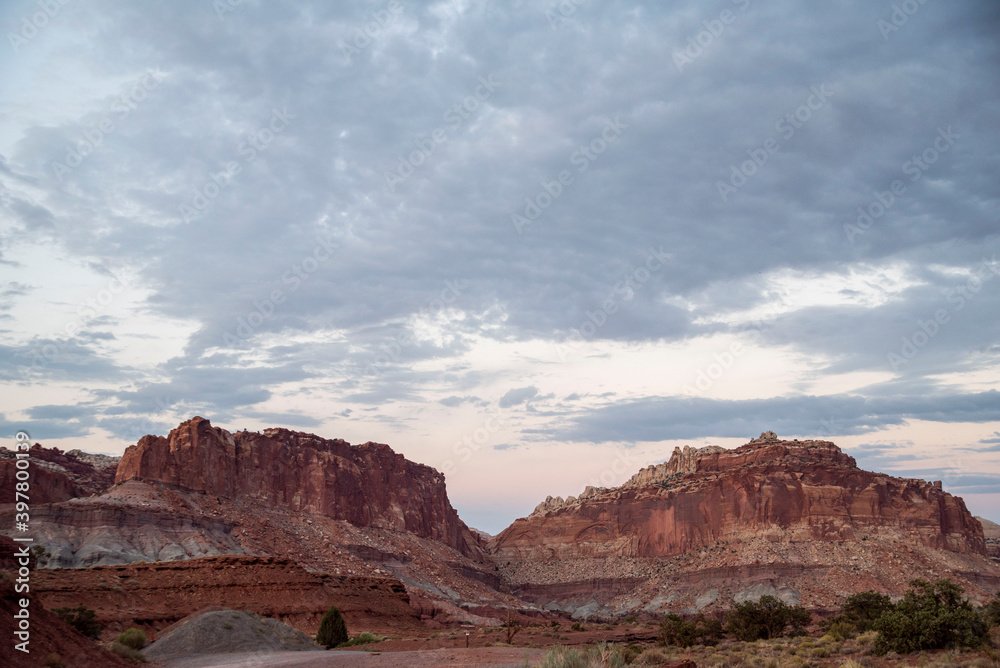pink sunset above red rock desert in capital reef