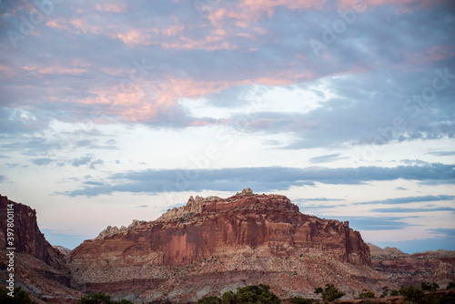 pink sunset above red rock desert in capital reef