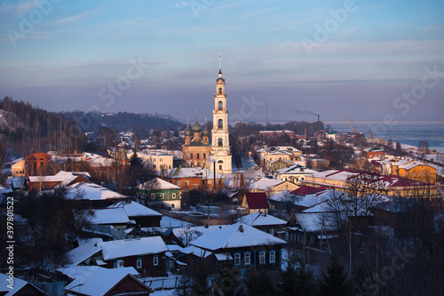 Old Russian city in winter. City of Yurievets in winter. Winter sleep. Snow-white bell tower of the city. Panorama of the old city.