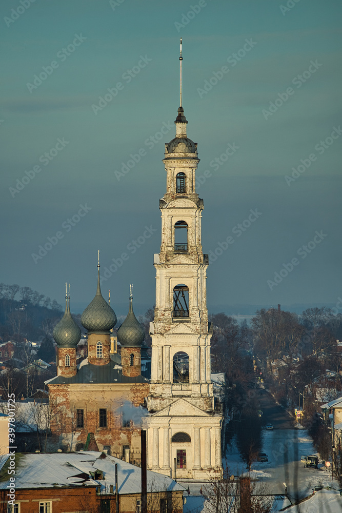 Old Russian city in winter. City of Yurievets in winter. Winter sleep. Snow-white bell tower of the city. Panorama of the old city.