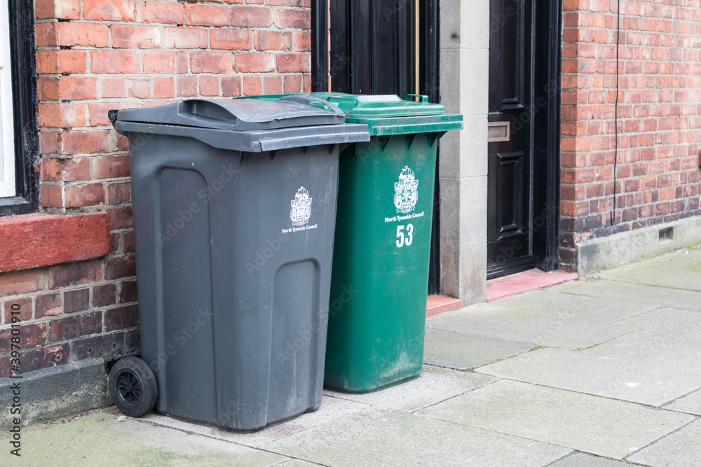 Wheely bins on pavement awaiting collection with North Tyneside Council