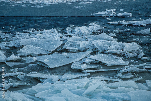 Pieces of ice. Beautiful ice chunks on the river. Ice on the river.