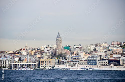 Galata Tower is another symbol of old Istanbul, shot from boat which was on the sea. © Ali Burçin Titizel