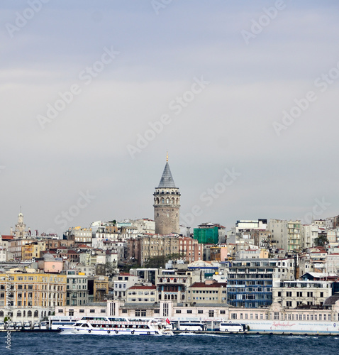 Galata Tower is another symbol of old Istanbul, shot from boat which was on the sea.