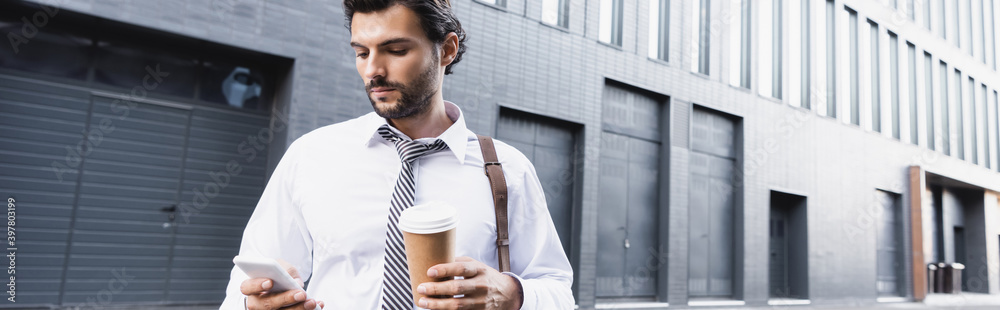 bearded businessman in formal wear holding paper cup and using smartphone, banner bearded businessman in formal wear holding paper cup and using smartphone, banner
