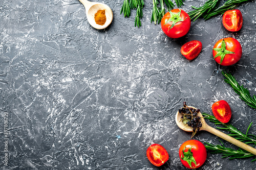 restaurant kitchen with tomato and rosemary on gray background top view mockup