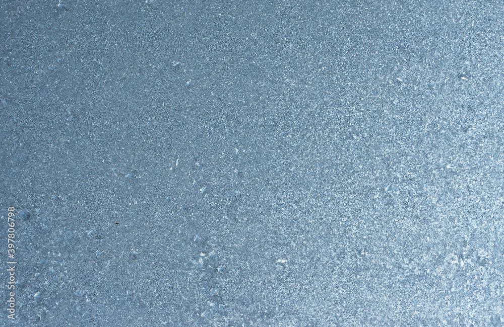 Winter background on a transparent glass of a window with a frozen texture. Abstract texture background, horizontal image, copy space for your design or text Winter background on a transparent glass of a window with a frozen texture. Abstract texture background, horizontal image, copy space for your design or text