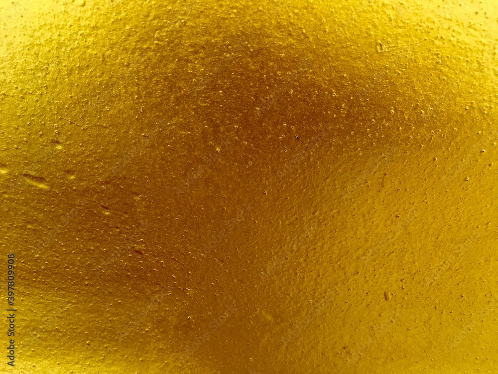 Gold cement wall texture background Gold cement wall texture background