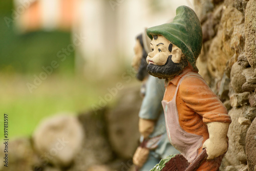 Detail of decorative terracotta dwarf statues for homes. Mountain gnomes.