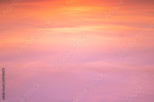 Beautiful twilight pink sky in soft and smooth clouds in the sunset with pastel color background