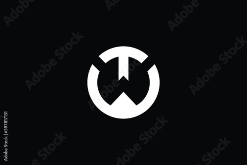 WT logo letter design on luxury background. TW logo monogram initials letter concept. WT icon logo design. TW elegant and Professional letter icon design on black background. W T TW WT photo