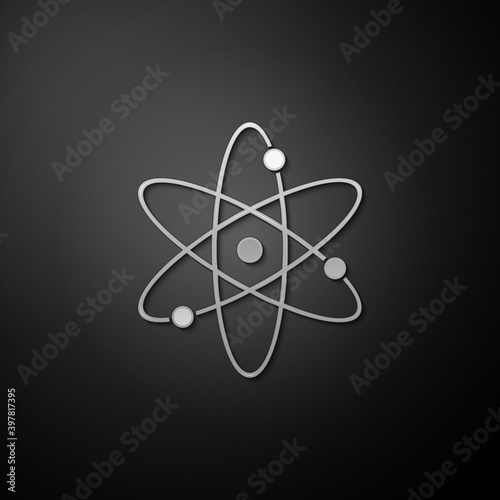 Silver Atom icon isolated on black background. Symbol of science, education, nuclear physics, scientific research. Electrons and protonssign. Long shadow style. Vector.