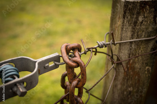 abandoned zone with rusty chain and padlock