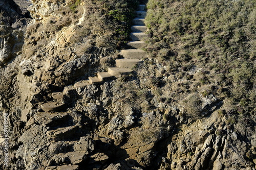 A small path at the wild coast of le Pouliguen on the Atlantic coast of France.