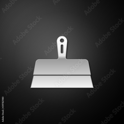 Silver Putty knife icon isolated on black background. Spatula repair tool. Spackling or paint instruments. Long shadow style. Vector.
