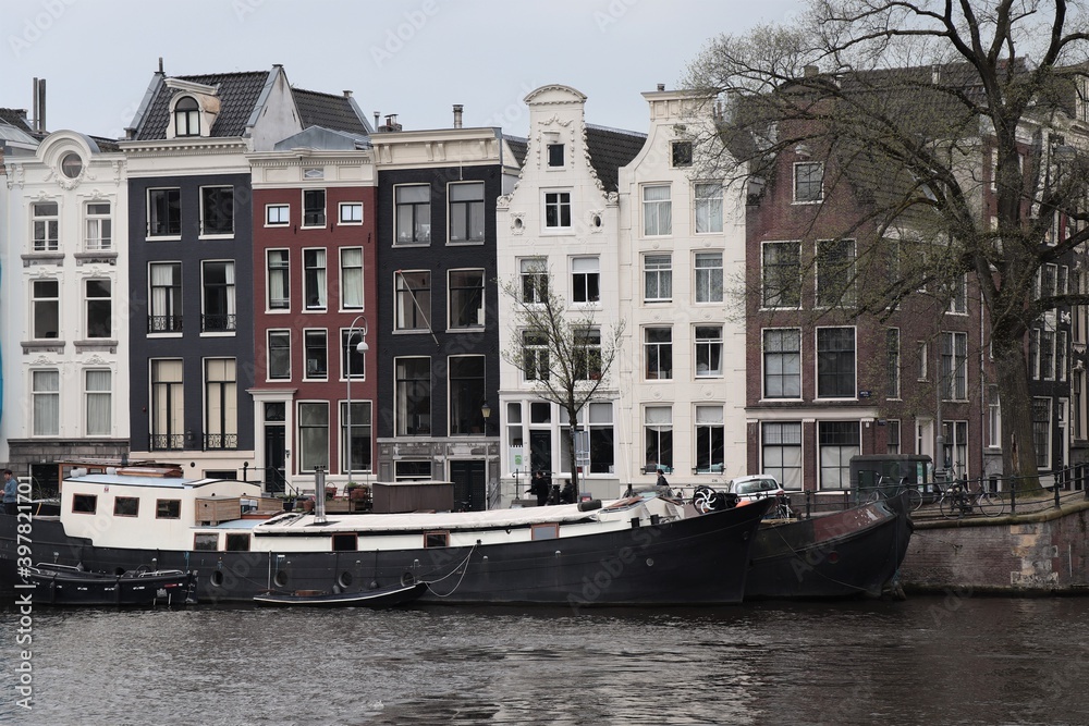 Old Houses with Boat in Amsterdam