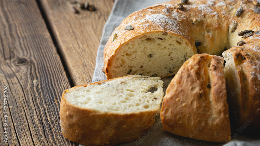 Fresh bread with cereals and pumpkin seeds Fresh bread with cereals and pumpkin seeds