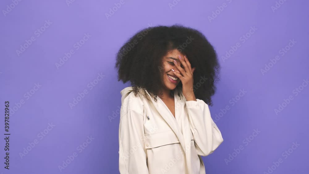 Young african american curly woman confused, feels doubtful and unsure Young african american curly woman confused, feels doubtful and unsure