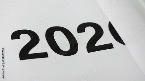Printing 2021 page on 2020 page, new year change concept